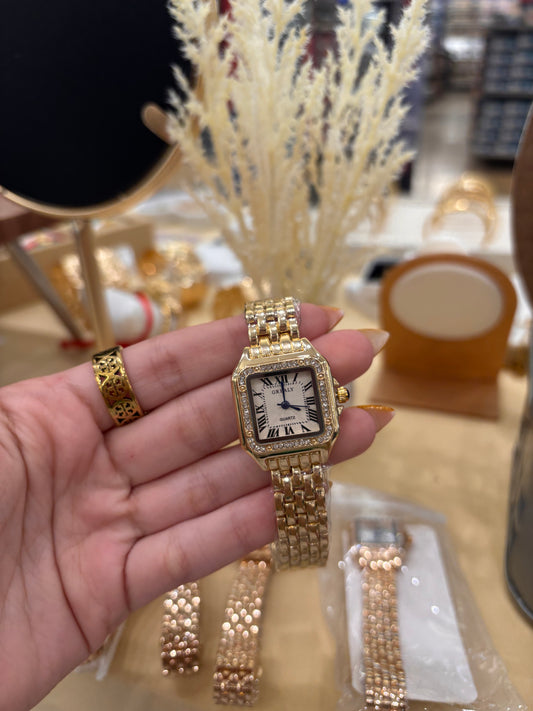 Gold glitter watch