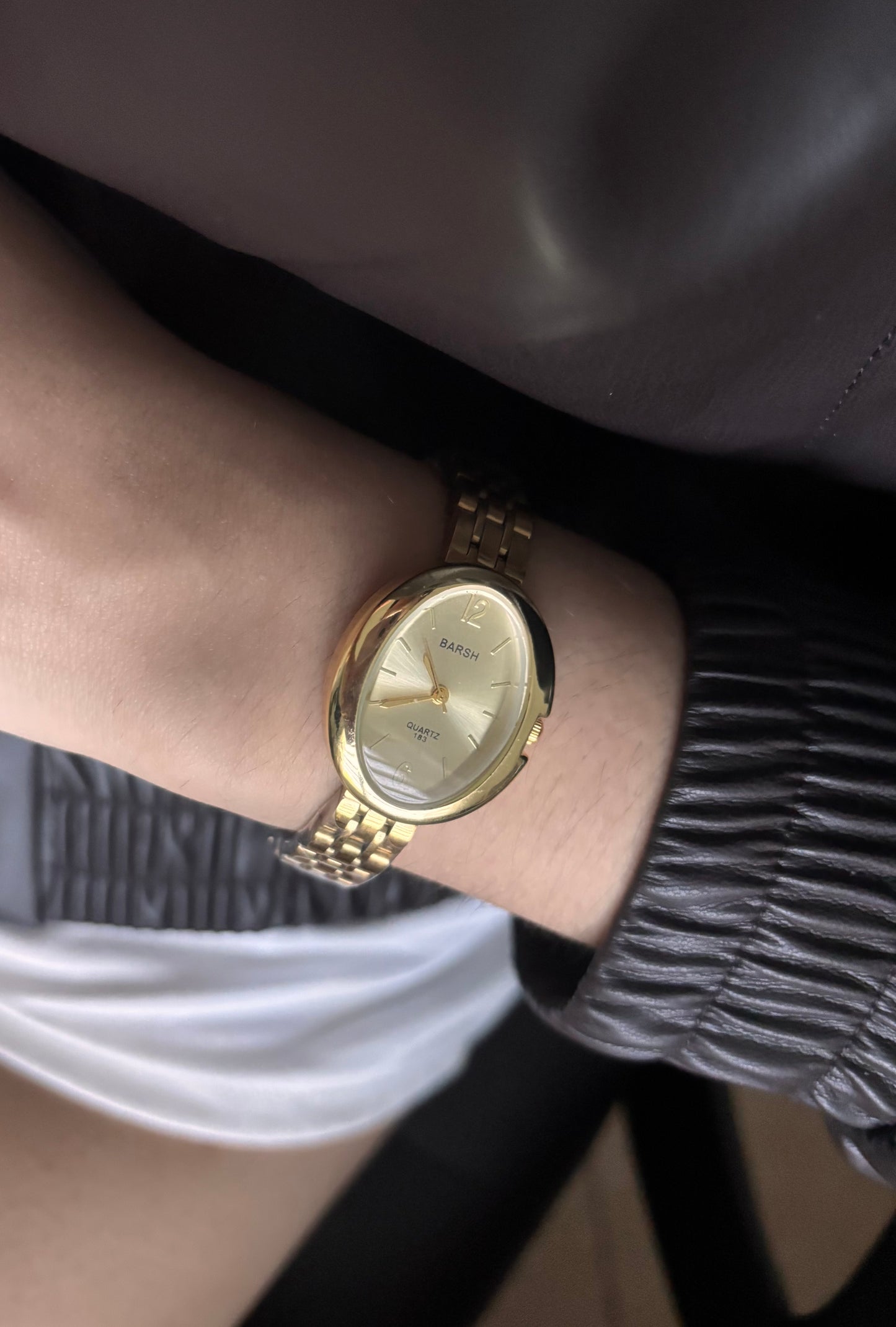 Gold Oval Watch